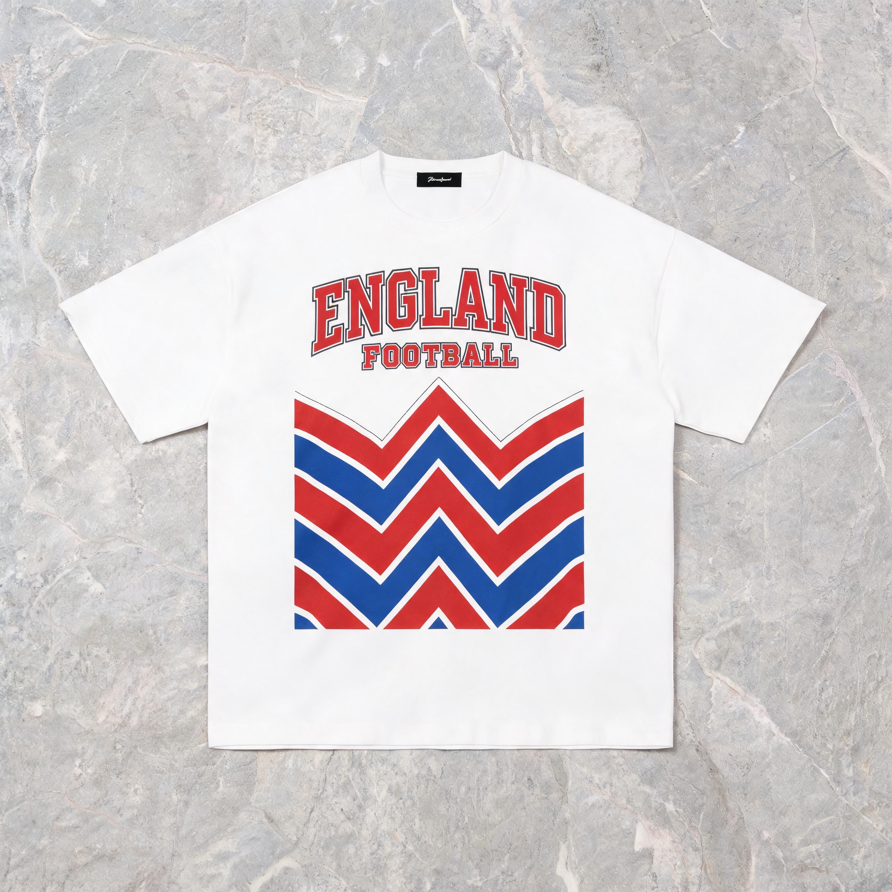 England 2026 unisex cotton tee on model — front view, white colorway, studio background
