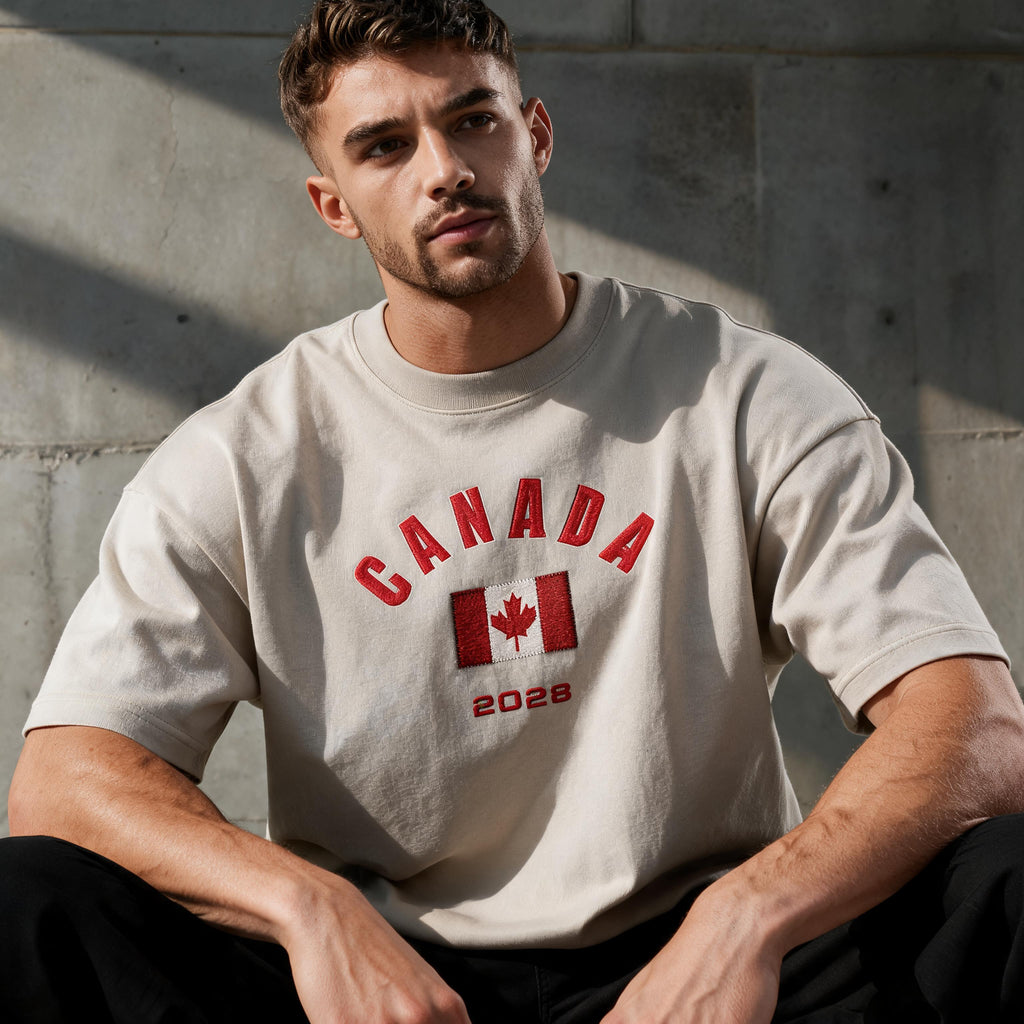 Canada 2026 unisex cotton tee — mid-shot detail of front graphic print