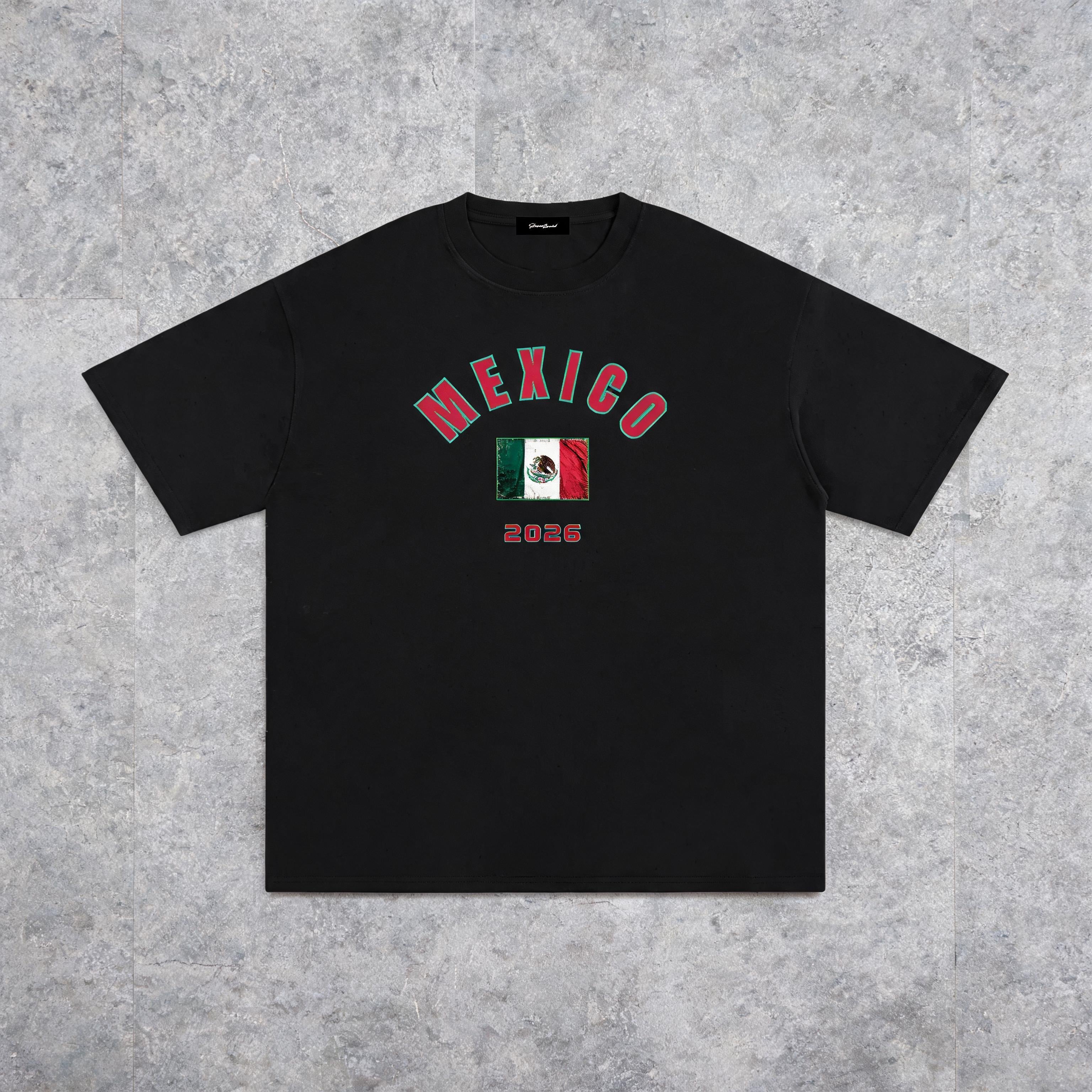 Mexico 2026 unisex cotton tee on model — front view, slate studio background