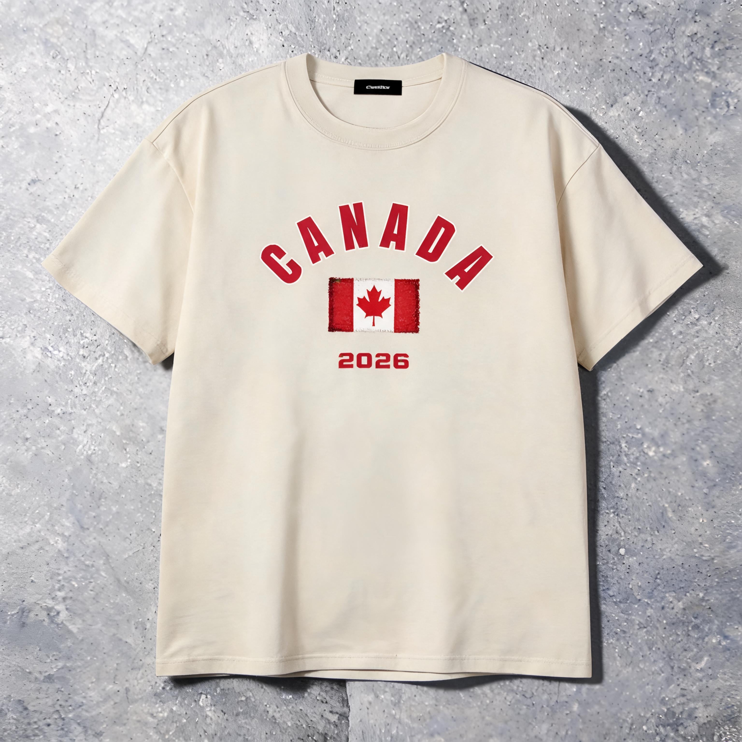 Canada 2026 unisex cotton tee on model — front view, slate studio background